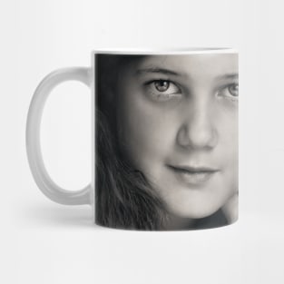 The poetry that fills her heart shows in her eyes. Mug